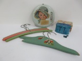 Baby lot with wooden hangers, advertising thermometer and baby bank in box