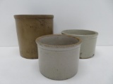 Three stoneware crocks, all have some damage