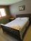 Queen size bed, two tone wood, with sheets and Dreams Geneva pillow top mattress included