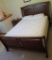 Queen size bed, sleigh style style with Sealy mattress included