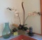 Floral arrangements, aqua jar and candle