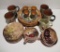 Assorted decorative dishes, mugs, egg cups, plates, two different designs