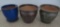 Three ceramic flower pots, 12