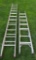 Two aluminum extension ladders