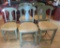 Four Thomasville green painted counter stools and one matching side chair