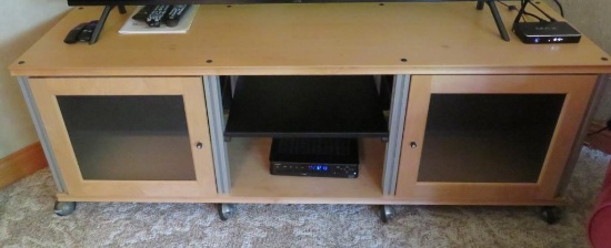 Entertainment cabinet, natural finish, on rollers, 66" x 20" , 23" tall, electronics not included