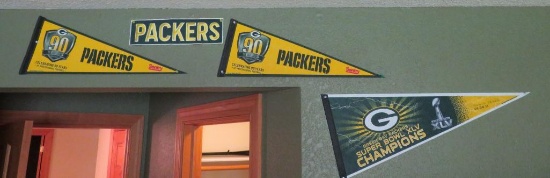 3 Packer Pennants, Packer patch and two Damian Miller bobble heads