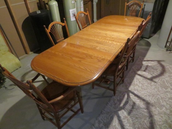 Large Table and Six Chairs, four leaves, honey oak color