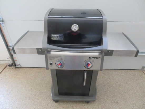 Weber Spirit gas grill, black and stainless, works