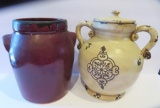 Two earthenware pots, one with cover, 9