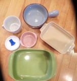 Five pieces of ceramic storage and cookware,