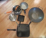 Six kettles and pans including Wok