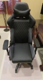Rolling leatherette desk chair and plastic mat