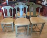 Four Thomasville green painted counter stools and one matching side chair