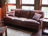 Brown leather sofa, three cushion, 92