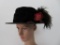 Great black velvet hat with velvet brush petunia and feather, about 8