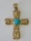 Gold cross with turquoise colored stone center, clasp is marked 14 kt