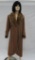 Brown ankle length coat with fur collar, velvet and cording trim