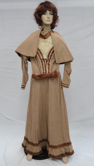 Three piece woman's suit, satin trim, brown and cream