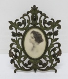Metal picture frame with portrait