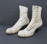 White leather high top button boots