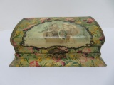 Celluloid dresser box, floral with two women walking in woods holding holly, 11
