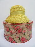 Yellow woven garden hat with rose patterned hat box