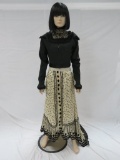 Patterned silk type skirt and green and black waist