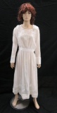 White linen tea dress, embroidered bodice and buttons with lace trim
