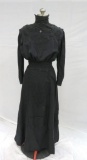 Black dress with brocade and lace at collar