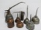 Eight Vintage oil cans, 7 