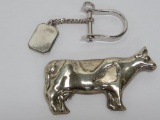 Silver cow pin and stirrup