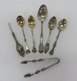 Seven sterling spoon and tongs, 4