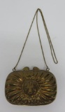 Brass purse with lion head, velvet lined, purse is 4
