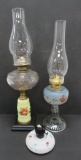 Three oil lamps, floral decorated, 4