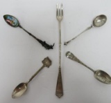 Five interesting collector spoons and condiment fork
