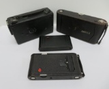 Four Vintage Kodak cameras, three folding and one Cine-Movie