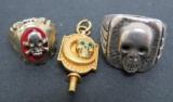 Three Skull themed jewelry pieces, large 925 ring and pin