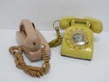 Two vintage telephones, rotary and push button