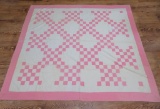 Pink and White patchwork quilt, 76