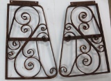 Two metal window grates, matching pair