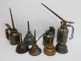 Eight vintage oil cans, 4 1/2