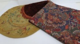 Needlepoint, velvet and paisley table covering and doilies