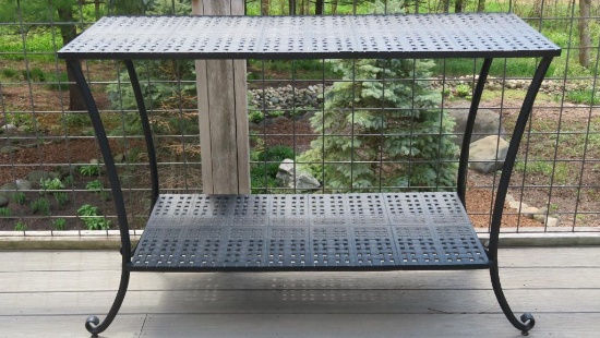 Heavy metal console table, about 50" long with shelf underneath, matches design of patio set