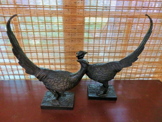 Two heavy cast metal pheasant figures, 12" long and 17" tall