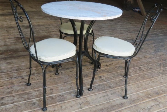 Bistro table and three metal chairs, stone top, 33"