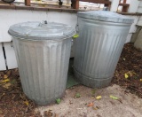 Two metal garbage cans, 24