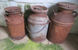 Three milk cans with lids, 20