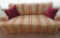 Ken Micheals plaid couch and two accent pillows, 70