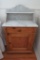 Great butternut and marble side cabinet wash stand, single drawer and single door